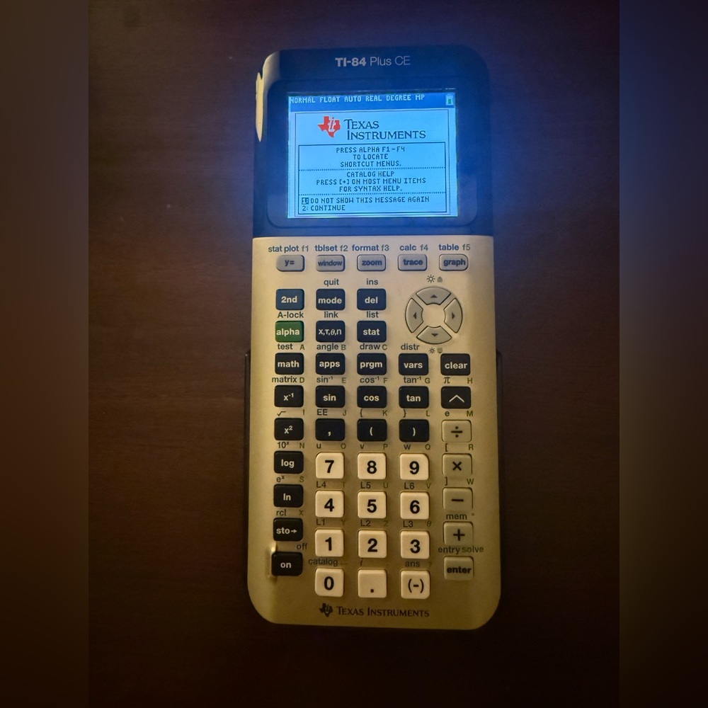 Texas Instruments TI-84 Plus CE in Gold